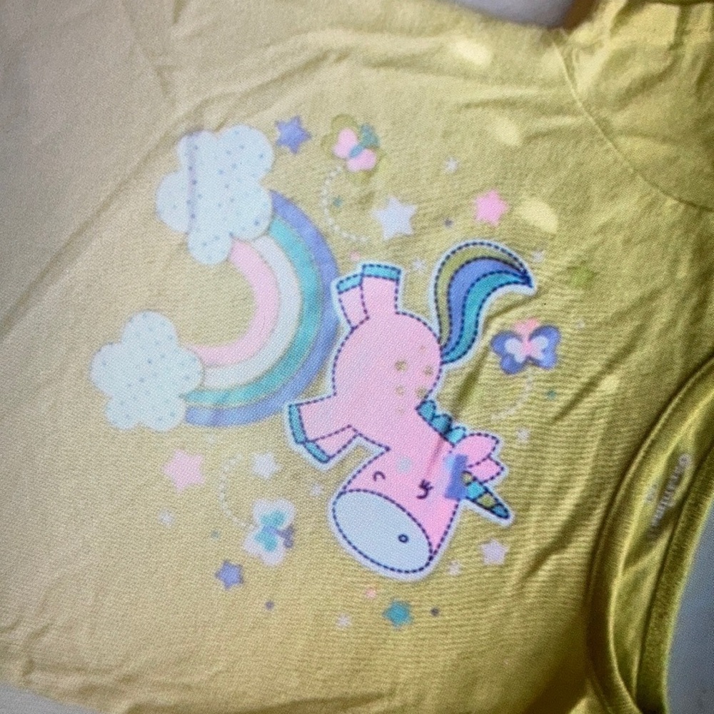 Imperfect condition unicorn kids top